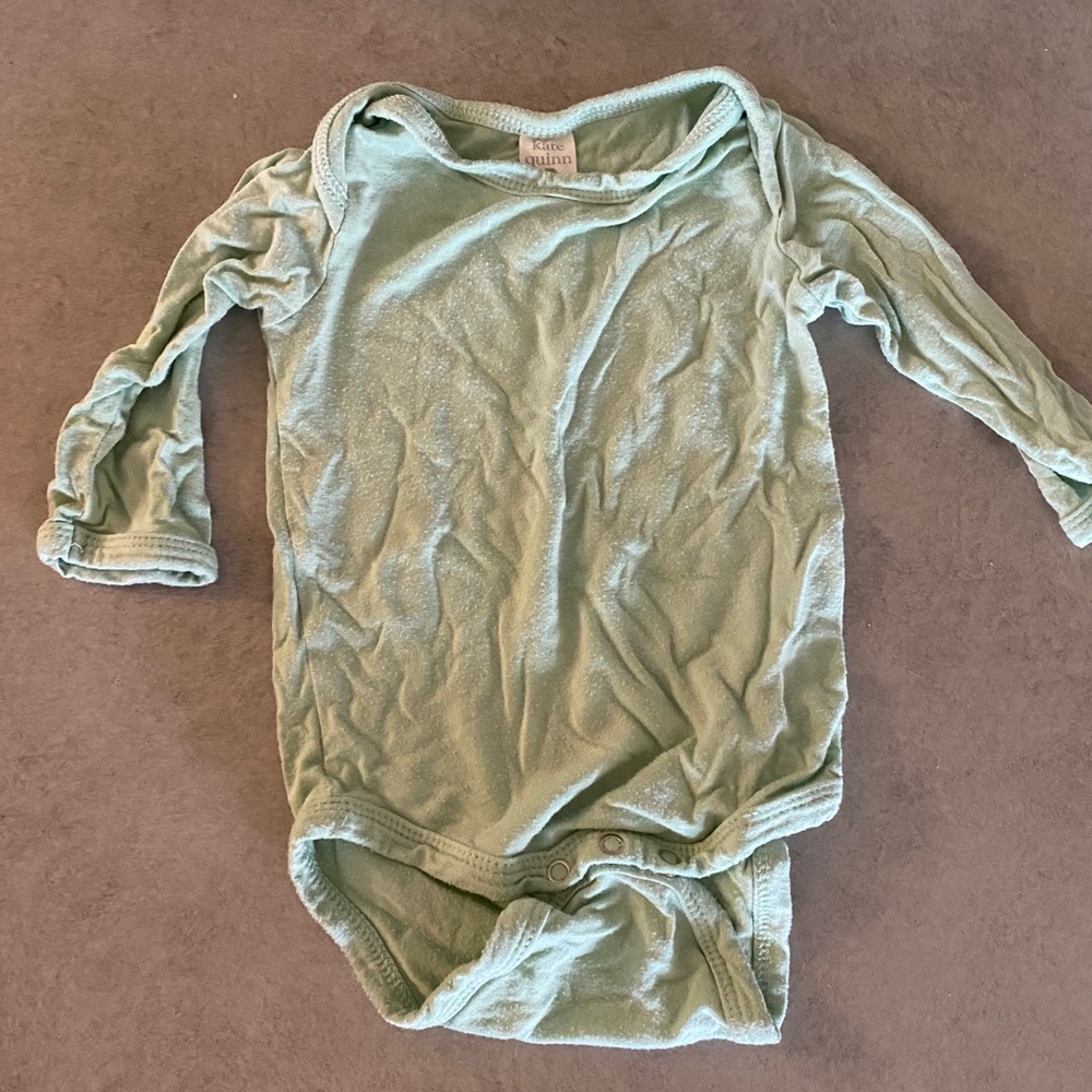 Kate Quinn onesie